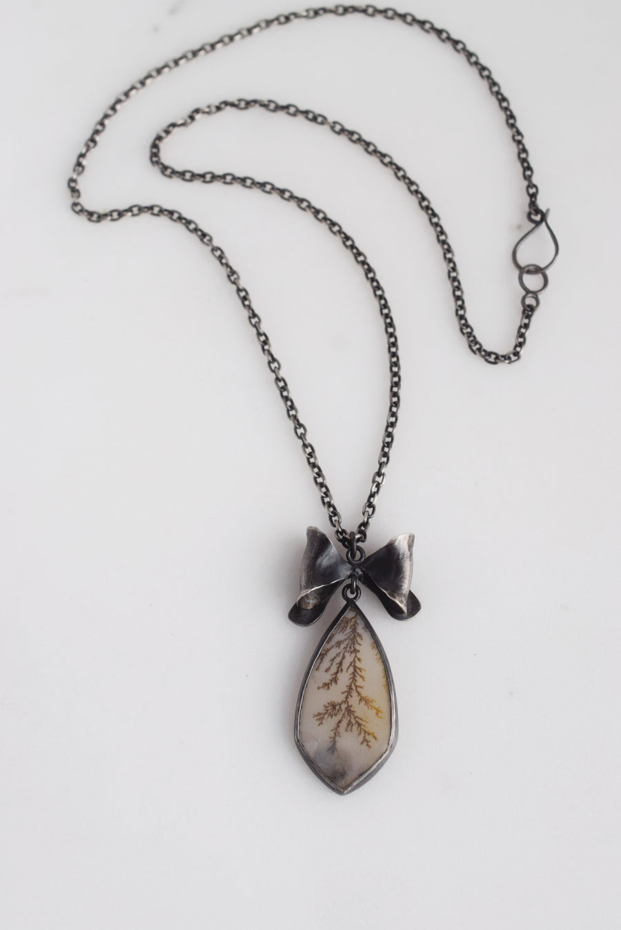 Bow and dendritic agate necklace
