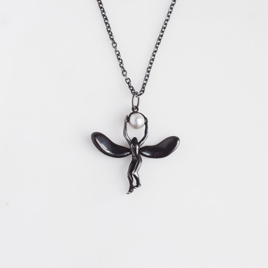 Green Winged Black Lady